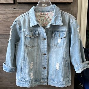 Light blue distressed denim jacket